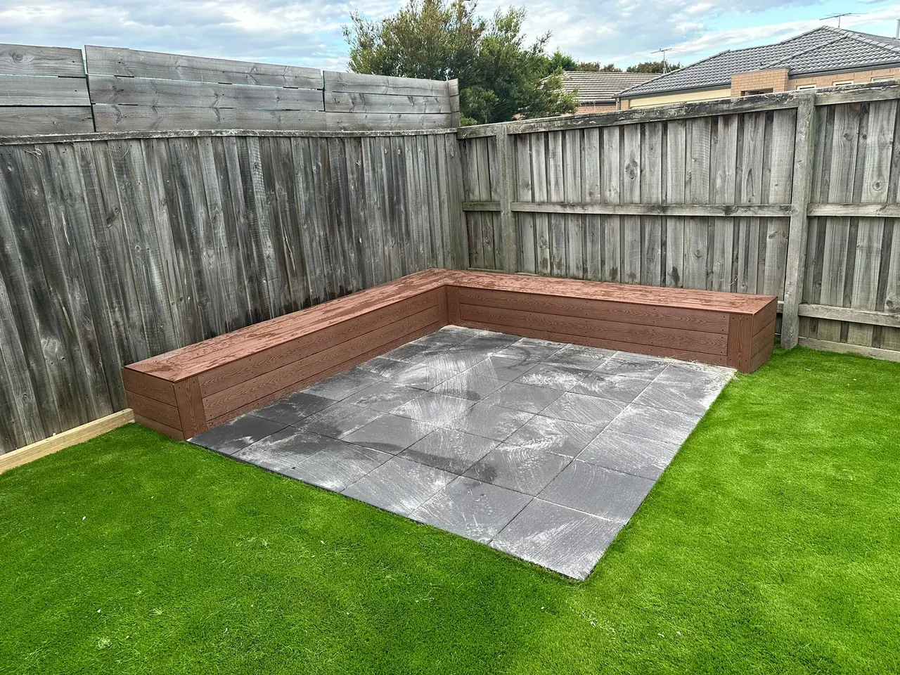 Garden bed and pebble landscaping in Berwick